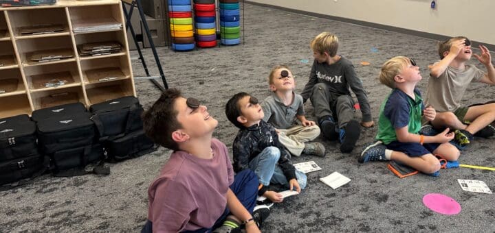 Students eating a cookie