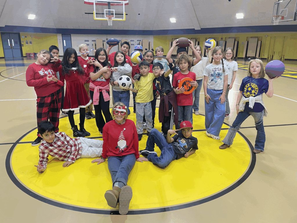 Mrs. Duncan's Crew pose for the a photo for the December Attendance Award