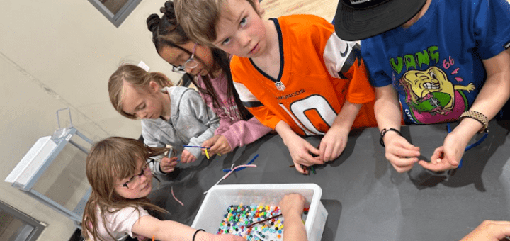 1st Graders making snowflakes