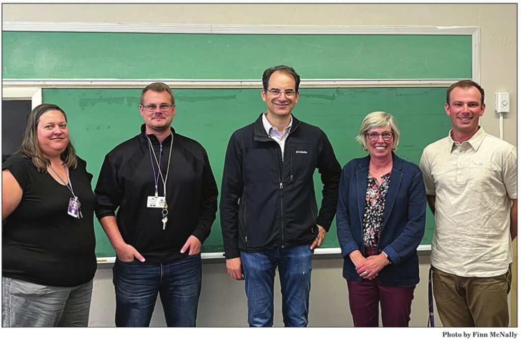 Photo of Phil Weiser and LCSD staff